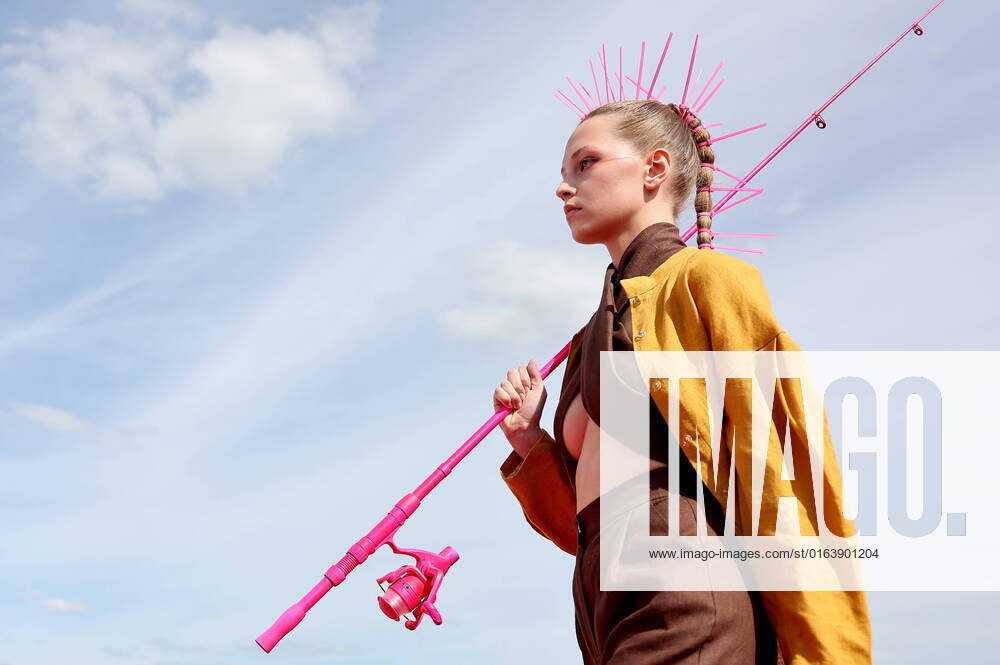KALININGRAD REGION, RUSSIA – JULY 30, 2022: A model wears a creation by Ksenia Solomonova during a fashion show at All-Russian Field Day Show in the village of Sokolniki. Organised by Russia s Ministry of Agriculture, All-Russian Field Day Show is an annual exhibition showcasing Russia s agricultural and industrial sector, including agricultural technologies, innovative methods of land management, state-of-the-art farming equipment, products from agricultural producers and breeders, and research institutes. Vitaly Nevar TASS TS13C453