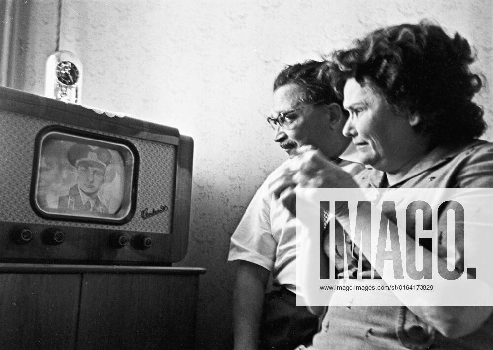 Fedor and Klavdia Bykovsky 612451 14.06.1963 Fedor and Klavdia Bykovsky, the parents of Soviet pilot-cosmonaut Valery Bykovsky (b. 1934), watching a TV news program about the flight of their son. the commander of the Vostok-5 spaceship (June 14 to 19, 1963). Snegirev Igor Sputnik Pavlovsky Posad Moscow region Russia