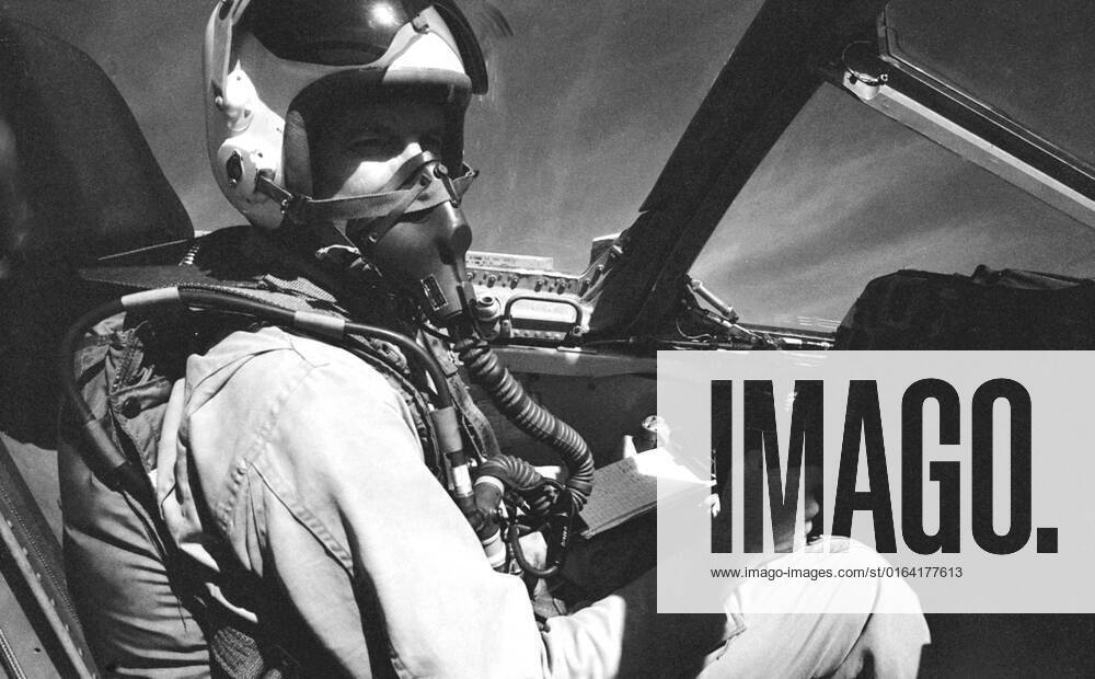 S63-03980 (1963) --- Astronaut L. Gordon Cooper Jr., prime pilot for the Mercury-Atlas 9 (MA-9) mission, in flight in a Convair TF-102 aircraft.