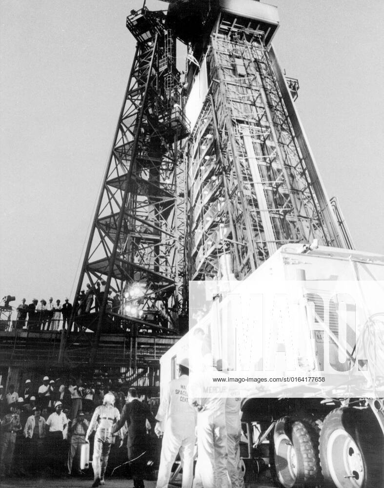 JSC2013-E-076221 (15 May 1963) --- Astronaut L. Gordon Cooper Jr. waited inside the transfer van for several minutes and then leaving the transfer van walked to the elevator which took him to the spacecraft Faith 7 atop the Atlas vehicle for his mission. (63-MA9-132)