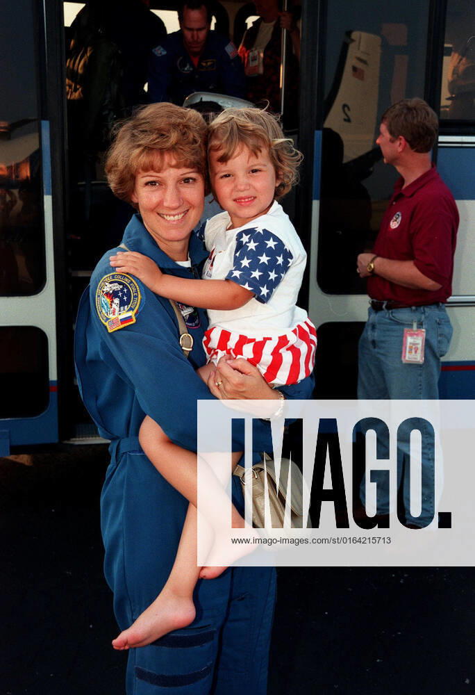 At the Skid Strip at the Cape Canaveral Air Station, Commander Eileen Collins and her daughter, Bridget Youngs, prepare to board an aircraft for their return flight to Houston following the completion of the STS-93 Space Shuttle mission. Landing occurred on runway 33 at KSC s Shuttle Landing Facility on July 27 with main gear touchdown at 11:20:35 p.m. EDT. The mission s primary objective was to deploy the Chandra X-ray Observatory, which will allow scientists from around the world to study some of the most distant, powerful and dynamic objects in the universe. This was the 95th flight in the Space Shuttle program and the 26th for Columbia. The landing was the 19th consecutive Shuttle landing in Florida and the 12th night landing in Shuttle