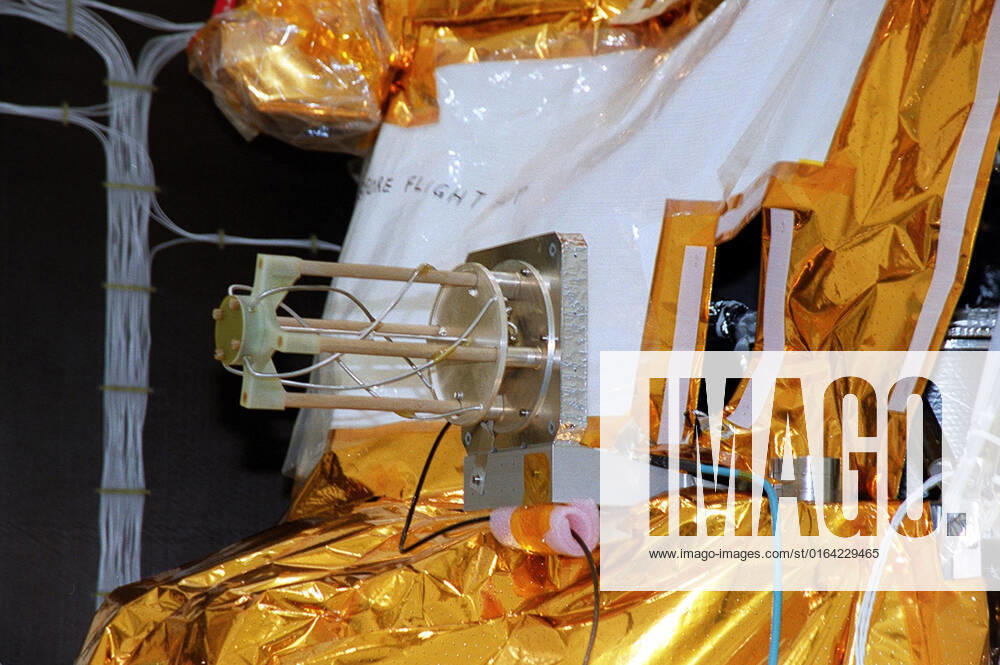Shown in this closeup is the UHF antenna on the Mars Odyssey Orbiter. The antenna is undergoing testing in the Spacecraft Assembly and Encapsulation Facility (SAEF 2). The 2001 Mars Odyssey Orbiter, scheduled for launch April 7, 2001, contains three science instruments: THEMIS, the Gamma Ray Spectrometer (GRS), and the Mars Radiation Environment Experiment (MARIE). THEMIS will map the mineralogy and morphology of the Martian surface using a high-resolution camera and a thermal infrared imaging spectrometer. The GRS will achieve global mapping of the elemental composition of the surface and determine the abundance of hydrogen in the shallow subsurface. The MARIE will characterize aspects of the near-space radiation environment with regards t