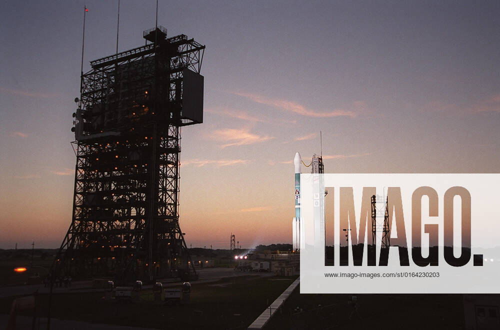 Dawn casts a pink glow as the Boeing Delta II rocket stands ready for launch after tower rollback. It is carrying the 2001 Mars Odyssey spacecraft that will begin its 7-month journey to Mars. Liftoff is scheduled for 11:02 a.m. EDT. The spacecraft, built by Lockheed Martin Space Systems for the Jet Propulsion Laboratory, will orbit Mars, mapping the surface looking for geological features that could indicate the presence of water, now or in the past. Science gathered by three science instruments on board will be key to future missions to Mars, including orbital reconnaissance, lander and human missions