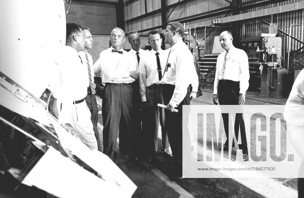 Five of the seven original astronauts are seen with Dr. von Braun inspecting the Mercury-Redstone hardware in the Fabrication Laboratory of Army Ballistic Missile Agency (ABMA) in 1959. Left to right Astronauts Walter Schirra, Alan Shepard, John Glenn, Scott Carpenter, Gordon Cooper, and Dr. von Braun.