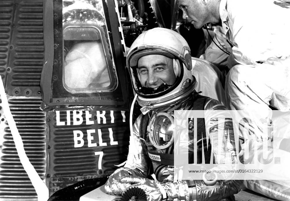 61-MR4-76 (1961) --- Astronaut Virgil I. (Gus) Grissom, suited up and ready to climb into Liberty Bell 7 spacecraft, poses for a picture. Backup pilot John Glenn is in the right corner of the view behind Grissom. The Mercury-Redstone 4 (MR-4) mission was scrubbed a few hours later due to unfavorable weather over the launch pad.