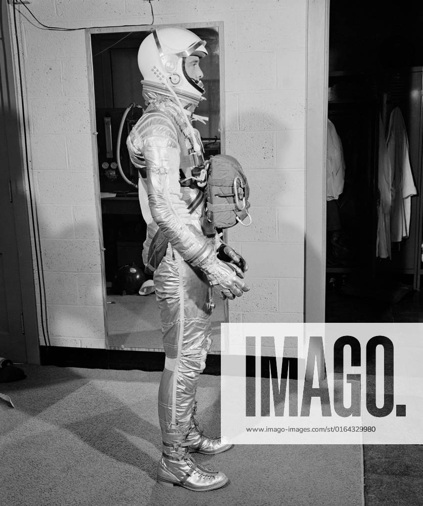 G60-02665 (1960) --- Astronaut Alan B. Shepard Jr., Mercury-Redstone 3 (MR-3) pilot, wearing pressure suit with body parachute.