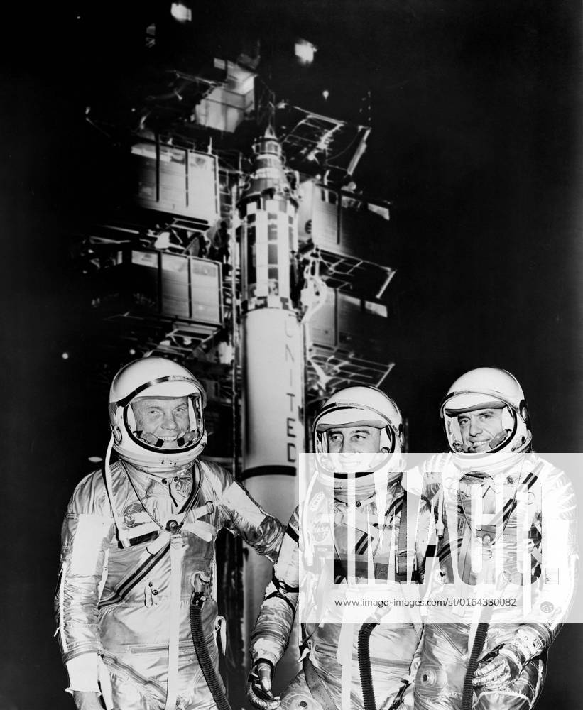 1961 -- The first three Americans in space, Mercury astronauts, from the left, John H. Glenn Jr., Virgil I. (Gus) Grissom and Alan B. Shepard Jr. standing by Redstone rocket in their spacesuits.
