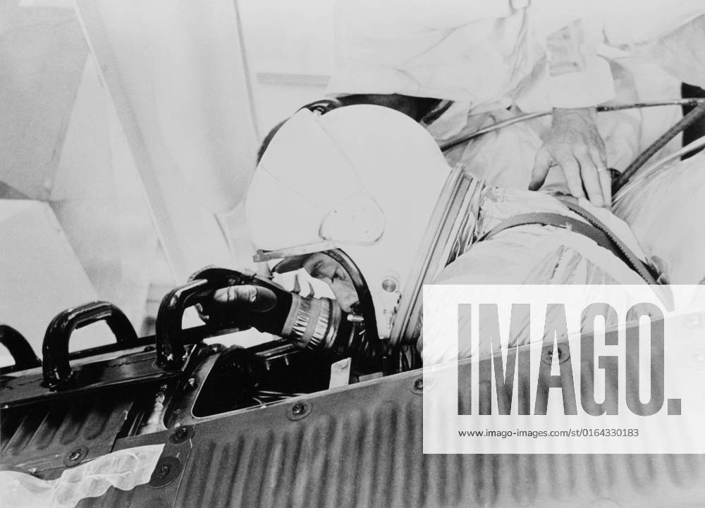 S61-03645 (5 May 1961) --- Close-up of astronaut Alan B. Shepard Jr., in his pressure suit and helmet, ingressing into the Freedom 7 capsule in preparation for the Mercury-Redstone 3 (MR-3) mission.