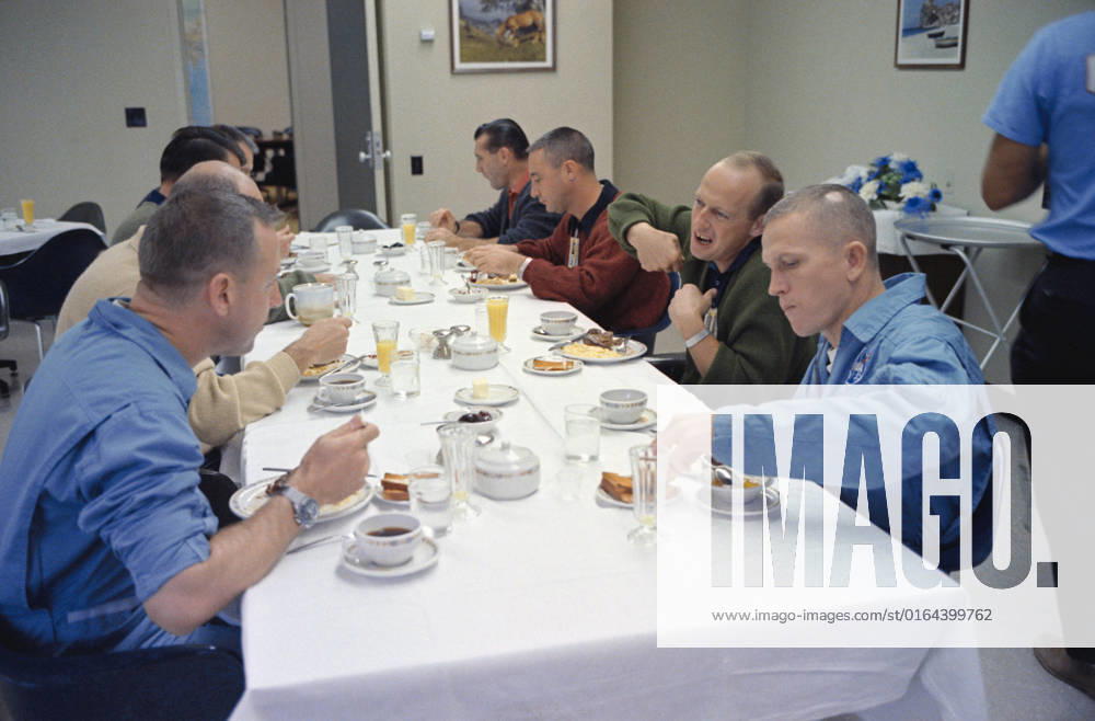 S65-59927 (4 Dec. 1965) --- Fellow astronauts join the Gemini-7 prime crew for breakfast in the Manned Spacecraft Operations Building, Merritt Island, on the day of the Gemini-7 launch. Clockwise around the table, starting lower left, are astronauts James A. Lovell Jr., Gemini-7 prime crew pilot; Walter M. Schirra Jr., Gemini-6 prime crew command pilot; Donald K. Slayton, MSC assistant director for Flight Crew Operations; Virgil I. Grissom, Gemini-6 backup crew command pilot; Charles Conrad Jr., Gemini-5 prime crew pilot; and Frank Borman, Gemini-7 prime crew command pilot.