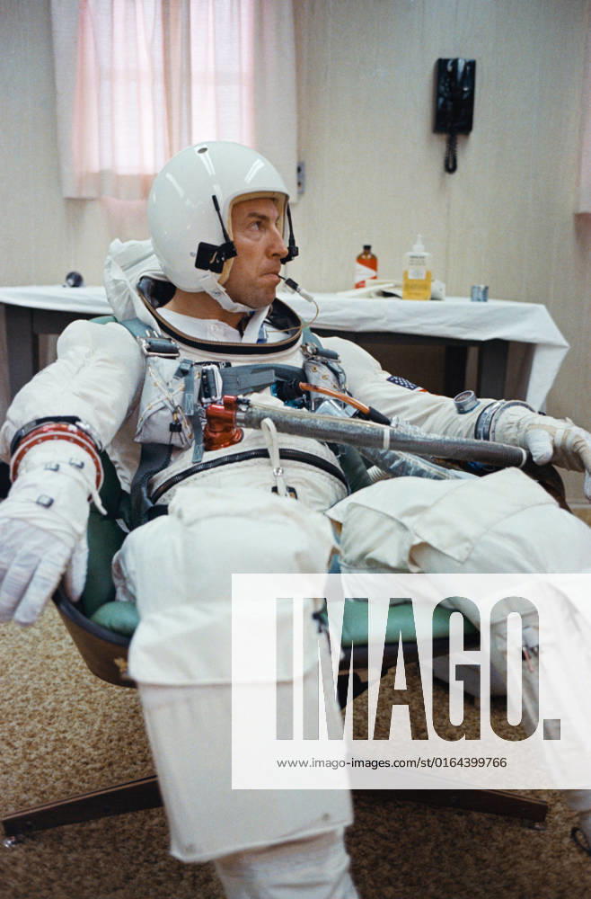 S65-59934 (4 Dec. 1965) --- Gemini-7 pilot James A. Lovell Jr. has a temperature check with an oral temperature probe attached to his spacesuit during a final preflight preparations for the Gemini-7 space mission. The National Aeronautics and Space Administration has planned a 14-day mission for the Gemini-7. The temperature probe allows doctors to monitor astronauts body temperature at any time during the mission.