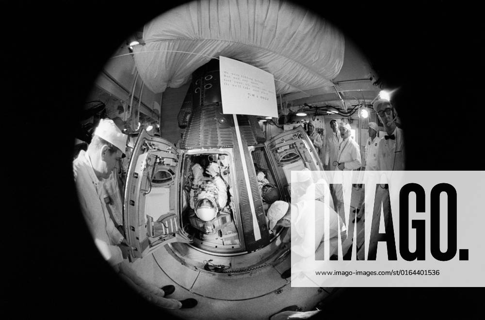 S66-34055 (3 June 1966) --- Fisheye camera lens view of the white room atop Pad 19 during the insertion of astronauts Thomas P. Stafford and Eugene A. Cernan into the Gemini-9A spacecraft. Minutes later the hatches were sealed on the spacecraft in preparation for launch of the proposed three-day mission.