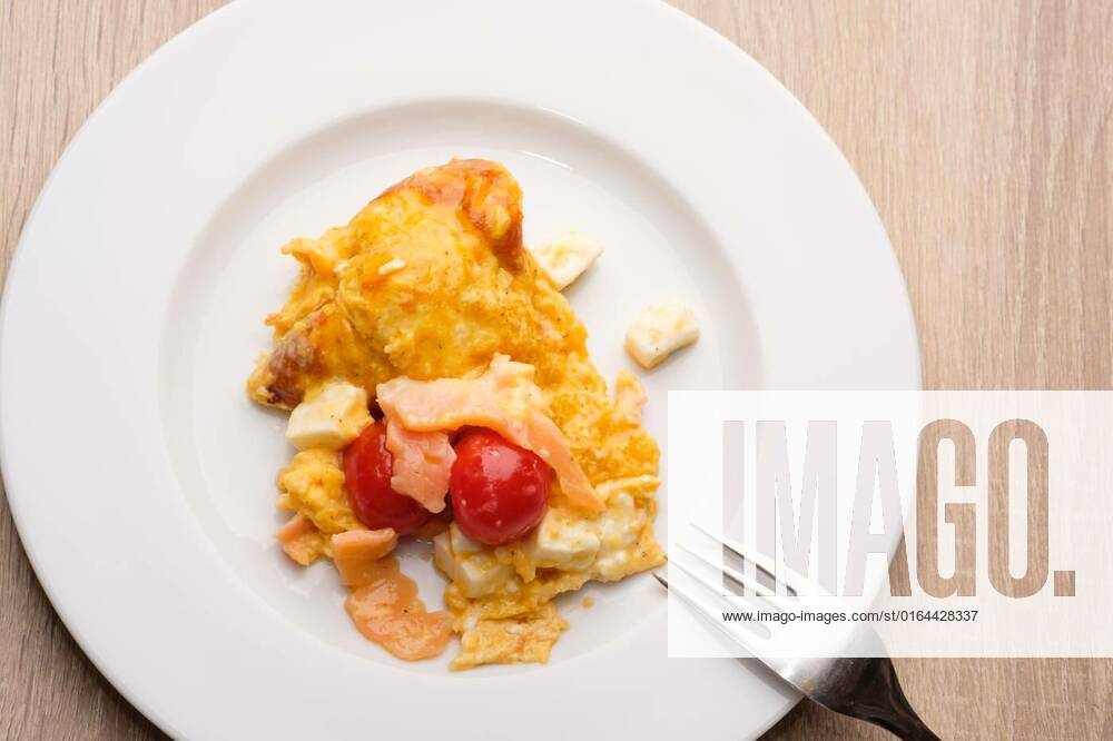 Omelett with smoked salmon and feta cheese, Omelett with smoked salmon, tomatoes and feta cheese as top view, 05.04.2020 14:49:11,