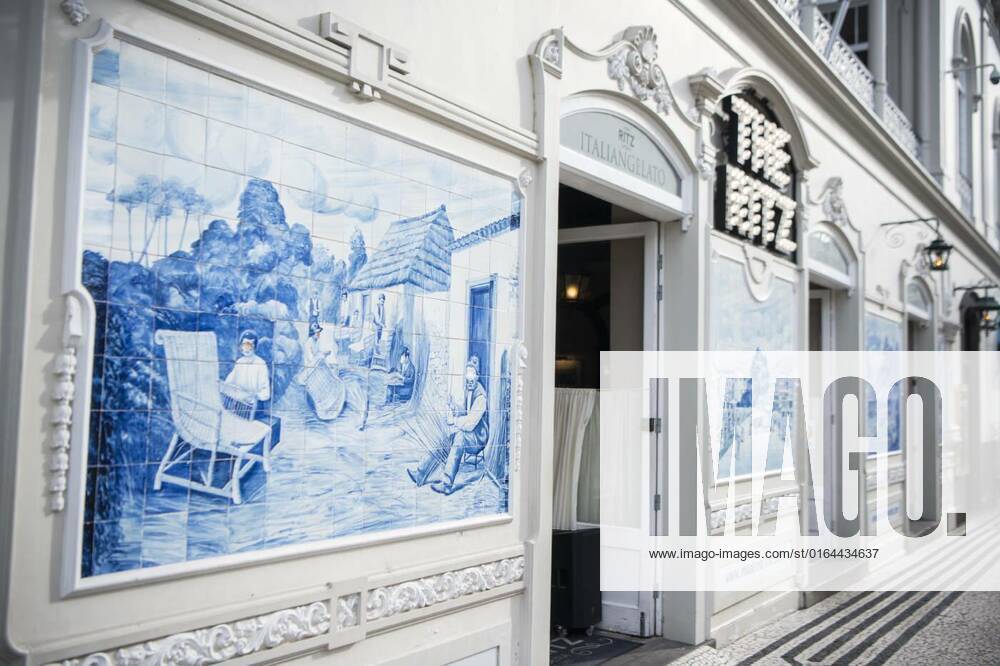 PORTUGAL MADEIRA FUNCHAL CITY CAFE RITZ, the handmade tiles or azulejo on the wall of the cafe Ritz in the city centre of Funchal on the Island Madeira of Portugal. Portugal, Madeira, April 2018, the handmade tiles or azulejo on the wall of the cafe Ritz in the city centre of Funchal on the Island Madeira of Portugal. Portugal, Madeira, April 2018, 06.04.2020,