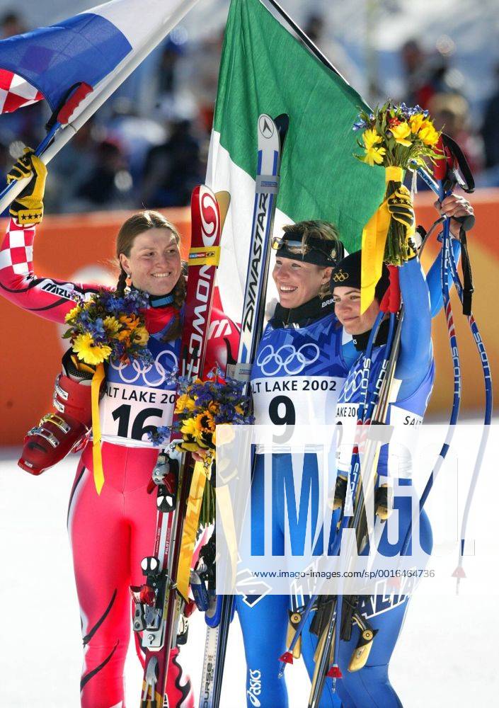 Feb. 17, 2002 - U.S. - KRT SPORTS STORY SLUGGED: OLY-ALPINE KRT PHOTOGRAPH BY RON JENKINS FORT WORTH STAR-TELEGRAM (DALLAS OUT) (February 17) SNOWBASIN, UT-- Womens Super G medal winners from left to right, Croatia s Janica Kostelic (16), silver, Italy s Daniela Ceccarelli (9), gold, and Italy s Karen Putzer (right), bronze, celebrate after the Women s Super-G event at Snowbasin, Utah Sunday February 17, 2002. (FT) BL NC KD 2002 (Vert) (lde) News Archive - Feb. 17, 2002 - ZUMAm67