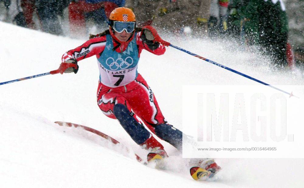 Feb. 20, 2002 - U.S. - NO MAGS, NO SALES -- (KRT102) KRT SPORTS STORY SLUGGED: OLY-ALPINE-SLALOM KRT PHOTOGRAPH BY ERICH SCHLEGEL DALLAS MORNING NEWS (February 20) PARK CITY, UT-- Croatia s Janica Kostelic speeds past a gate in heavy snow during the women s slalom in Deer Valley, Utah, Wednesday, Feb. 20, 2002 at the Salt Lake City Olympics. Kostelic now has three medals in the Salt Lake Games, two gold medals and one silver in alpine skiing events.(DA) AP NC KD BL 2002 (Horiz) (lde) (Additional photos available on KRT Direct, KRT NewsCom or upon request) News Archive - Feb. 20, 2002 - ZUMAm67