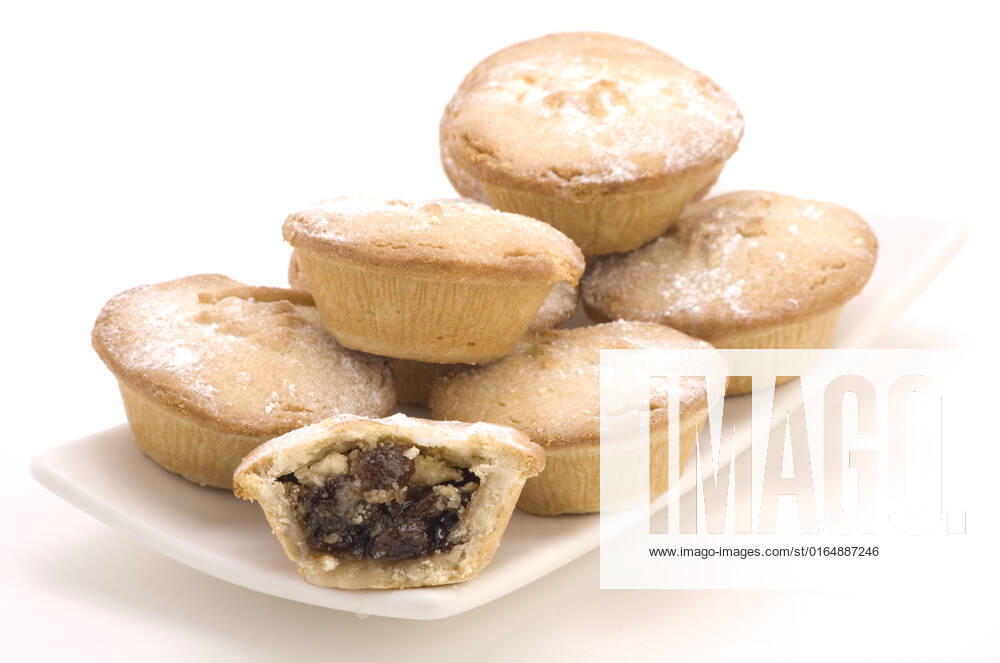 Multiple Mince Pies on a Plate isolated on a White background.