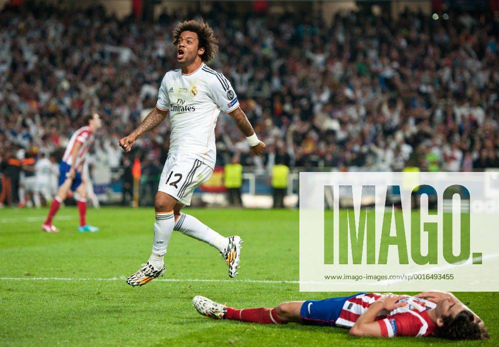 Jubel nach dem Tor zum 3:1; MARCELO (MAD links) jubelt waehrend TIAGO Cardoso Mendes (ATH rechts) enttäuscht am Boden liegt. Fussball international UEFA Championsleague FINALE 2014: Real Madrid CF - Club Atletico de Madrid im Estadio do Lisboa e Benfica in Lissabon, Portugal am 24.05.2014,