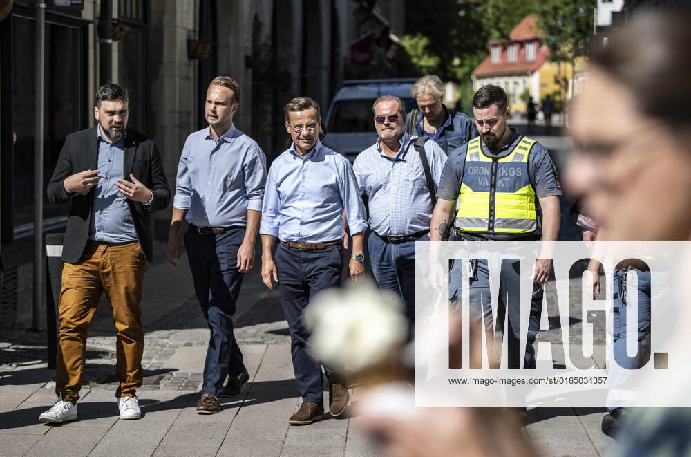 LUND 2022 08 10 Moderate Party leader Ulf Kristersson as he campaigns on Monday with a safety walk through the birthplace of Lund in the company of, among others, security guards and the municipalitys head of security LUND SWEDEN