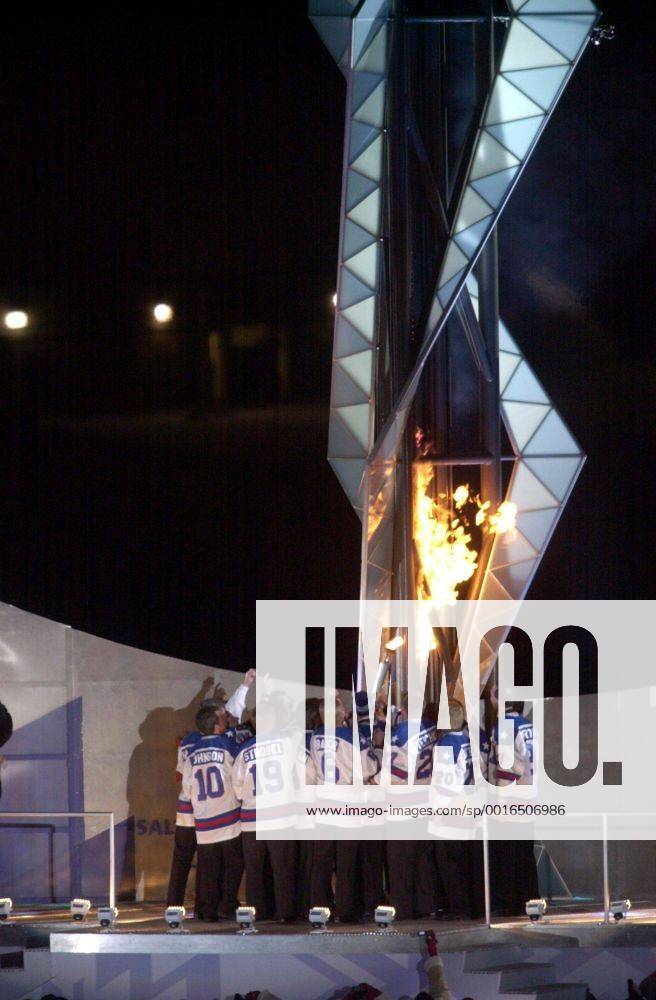 Feb. 8, 2002 - U.S. -- The 1980 US Hockey team, lead by team captain, Mike Eruzione, lights the Olympic cauldron at the Winter Olympic Opening Ceremony Friday February 8, 2002 in Salt Lake City, Utah. (SP) - Feb. 8, 2002 - ZUMAm67