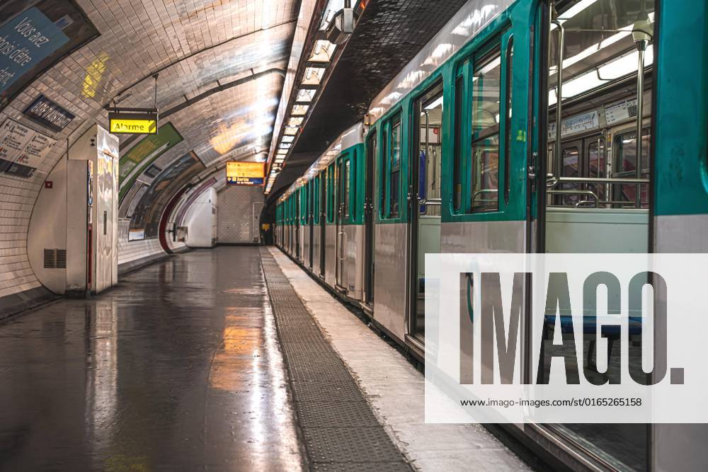Empty UBahn with open Doors in a Train station at Night, Paris, France, Europe