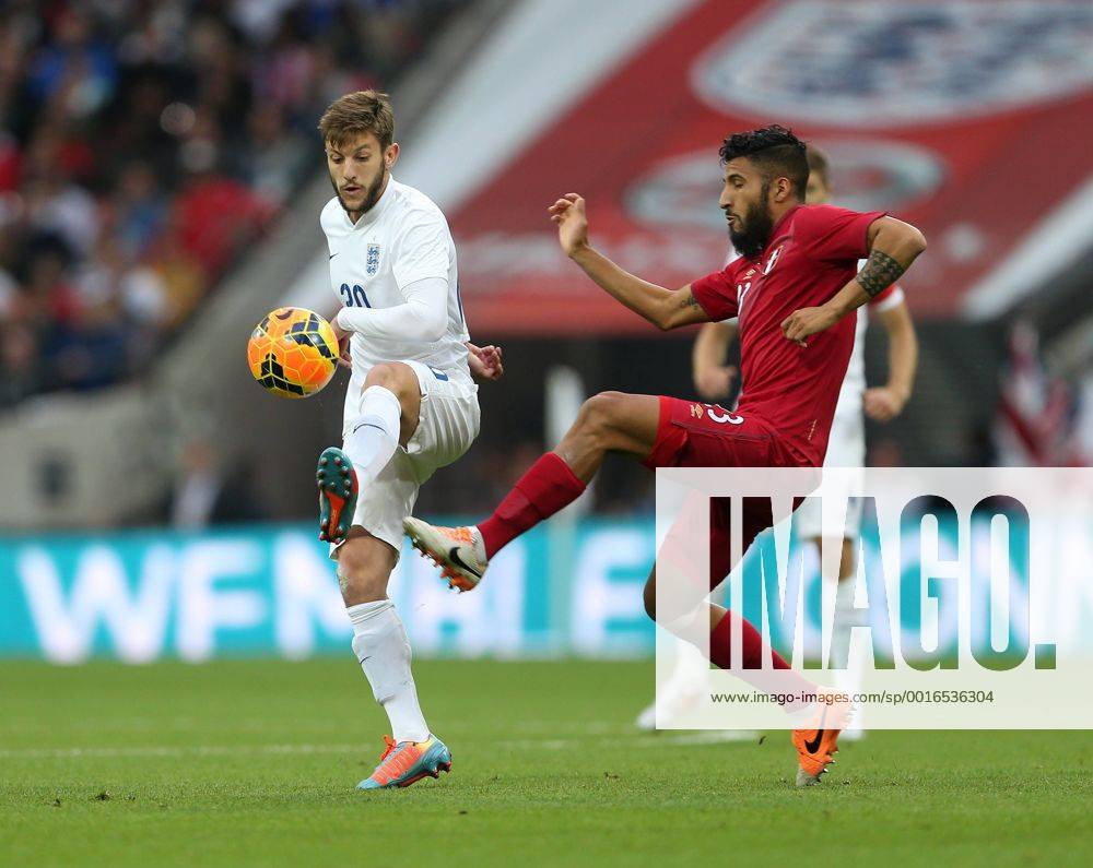 England s Adam Lallana tussles with Peru s Josepmir Ballon England v Peru - International Friendly - Wembley Stadium- London - England - 30 05 2014 - Pic David Klein Sportimage .