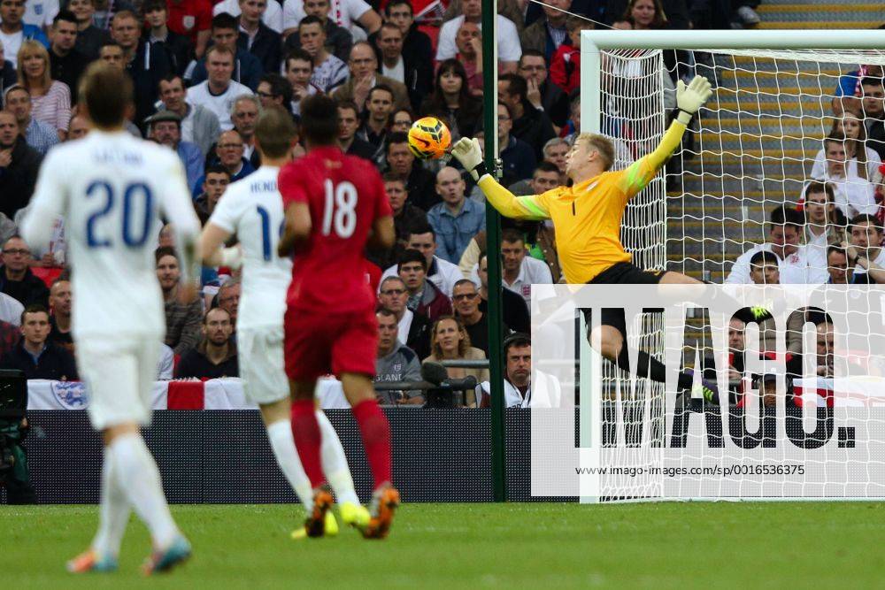 England goalkeeper Joe Hart makes a diving save - International Friendly - England vs Peru - Wembley Stadium - London - 30 05 2014 - Pic Charlie Forgham-Bailey Sportimage .