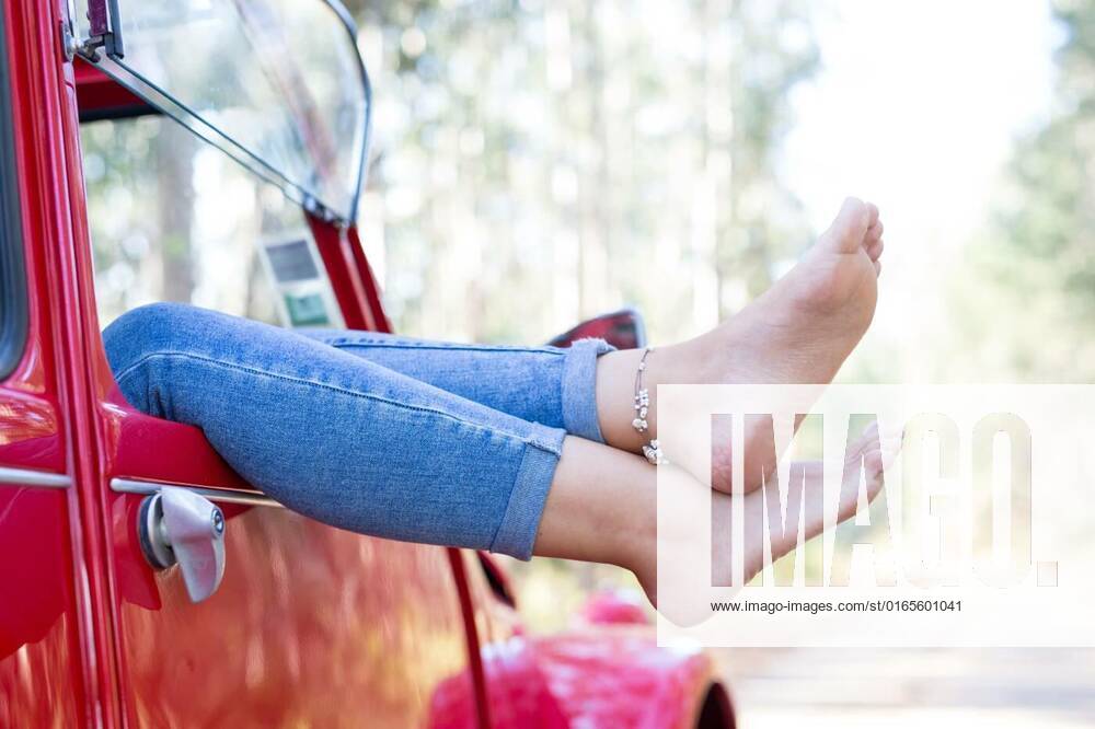 Vacations finally!, Woman on a roadtrip relaxing in her convertible car, Woman on a roadtrip relaxing in her convertible car model released, Symbolfoto , 22.01.2021,