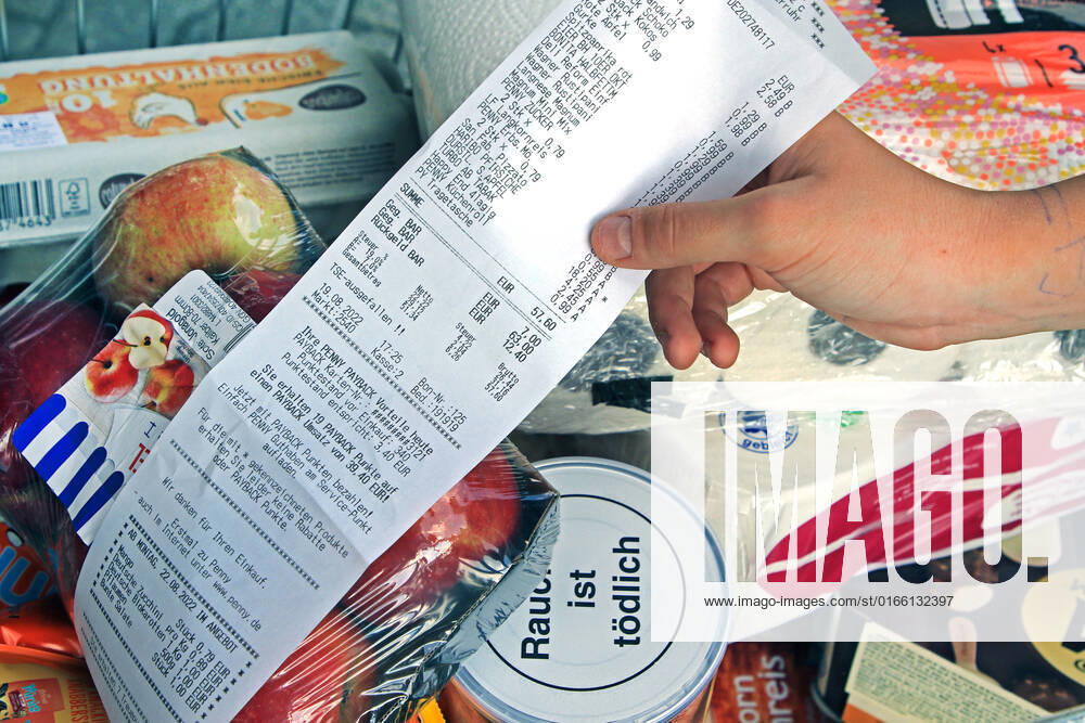 Price increase for groceries A bulging shopping cart filled with goods for everyday life