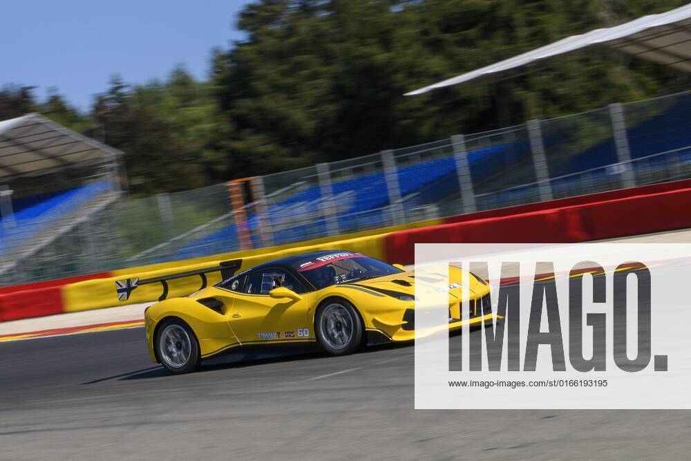 Race car Sports car Ferrari 488 Challenge Rest drives with Full throttle on Output from Curve Hairpin curve La Source from Racetrack, FIA Formula 1 Racetrack, Circuit de SPA Francorchamps, ardennes coaster, ardennes, Malmédy, Belgium, Europe