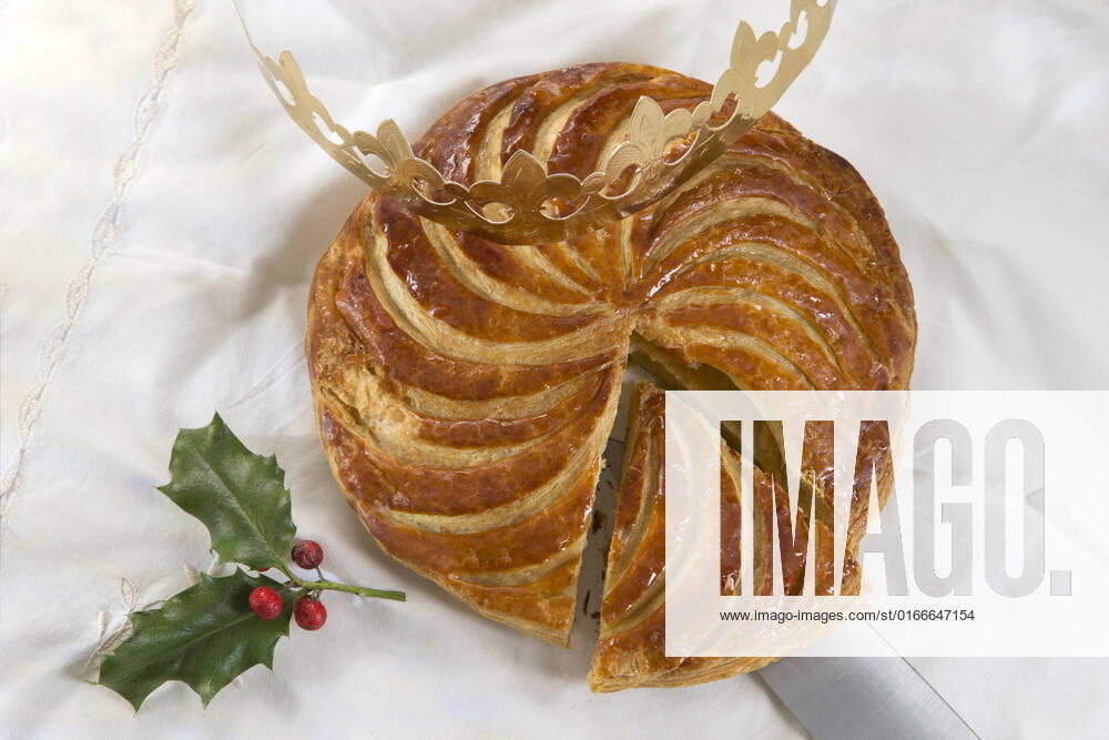 Epiphany cake-galette des rois , king cake , 19281778.jpg, almond, almond pastry, baked, bakery, biscuit, cake, celebration, confection, crown, decoration, dessert, epiphany, epiphany cake, festive, food, galette, holiday, king, pastry, pie, puff, recipe, slice, stuffed, sweet, traditional,