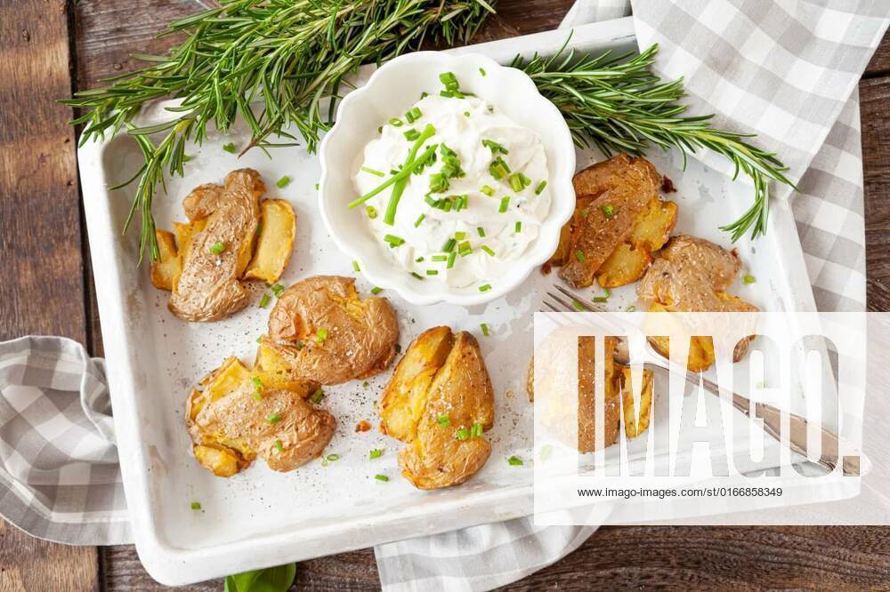 Smashed potatoes, crisp baked potatoes, Smashed potatoes, crisp baked potatoes with fresh rosemary, 05.05.2021,