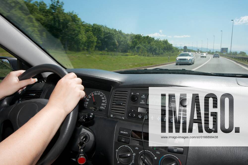 Driving a car viewed from inside , 2148001.jpg, drive, car, woman, female, driver, travel, steer, steering, wheel, straight, interior, road, transport, transportation, cockpit, rural, country, countryside, highway, clear, blue, sky, freedom, free, bright, sunny, day, go, take, trip, journey, roadtrip, inside, view, move, motion, auto, automobile, hand, forward, speed, dash, dashboard, board, traffic, arms, driveway, motor, motorized, fuel,