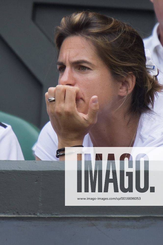 London, England. Wimbledon Tennis Championships Amelie Mauresmo watches during day one men s singles first round match at the Wimbledon Tennis Championships at The All England Lawn Tennis Club in London, United Kingdom. Waldronx ActionPlus11535616