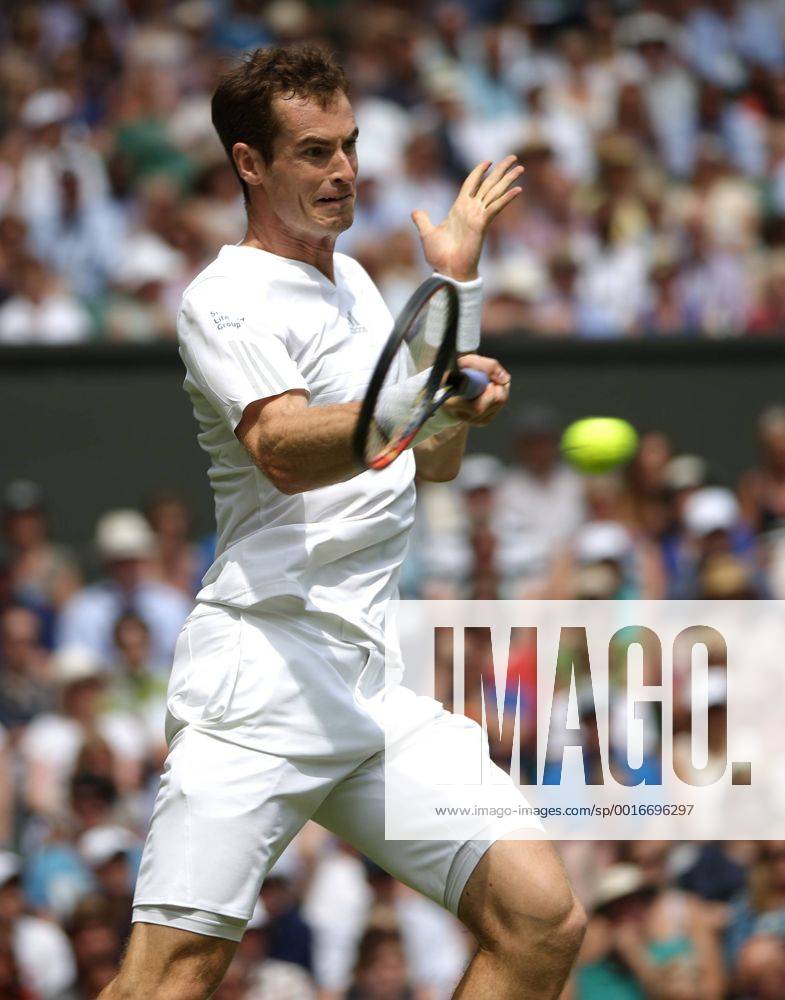 Britain s Andy Murray plays a forehand during his match on day one of the 2014 Wimbledon Championships in London on June 23, 2014. LON2014062302