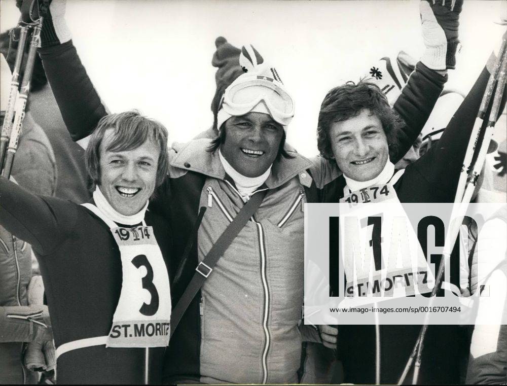 Feb. 02, 1974 - Biggest triumph for the once-King of Alpine skiing: Toni Sailer, winner of three gold medals at the Cortina d Ampezzo Olympics and trainer of the Austrian Olympics and trainer of the Austrian Alpine ski team (center) flashes a big smile as he hugs th downhill race winner David Zwilling (left) and Franz Klammer, race s second (r.). The Austrains scored their biggest triumph at the 23rd Alpine Ski World Championships here by winning one two the most important of all races. - ZUMAk09
