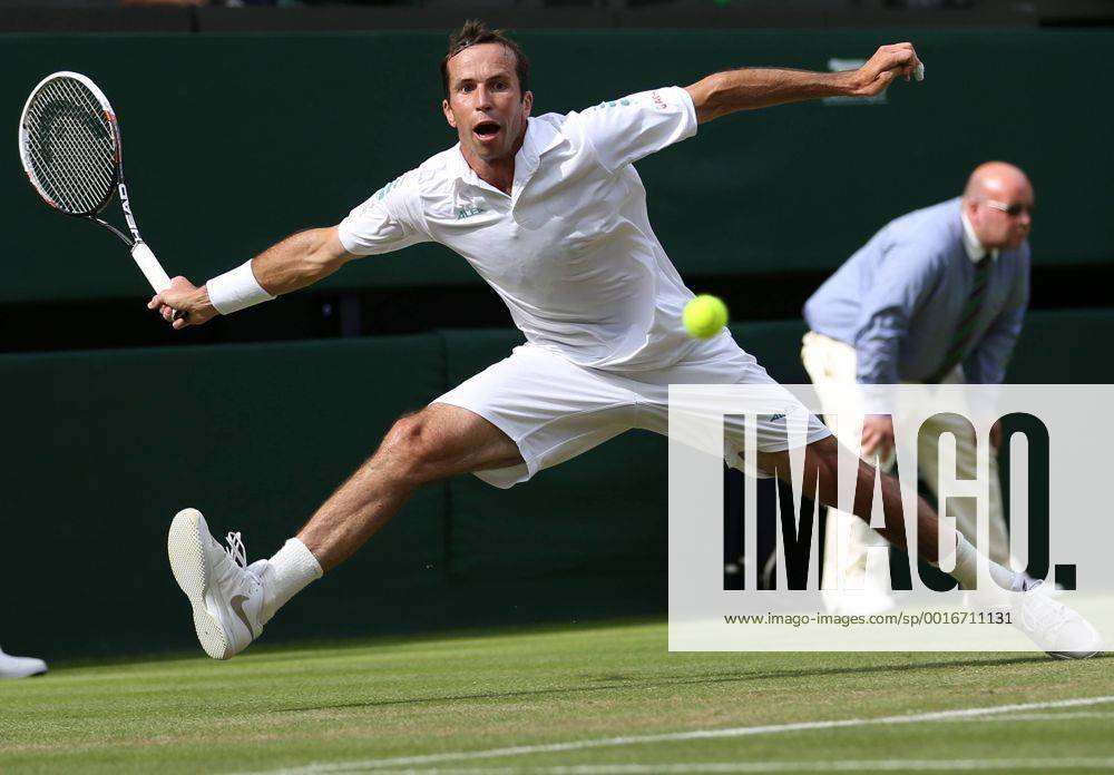 Czech Radek Stepanek returns in his match on day three of the 2014 Wimbledon Championships in London on June 25, 2014. LON2014062528