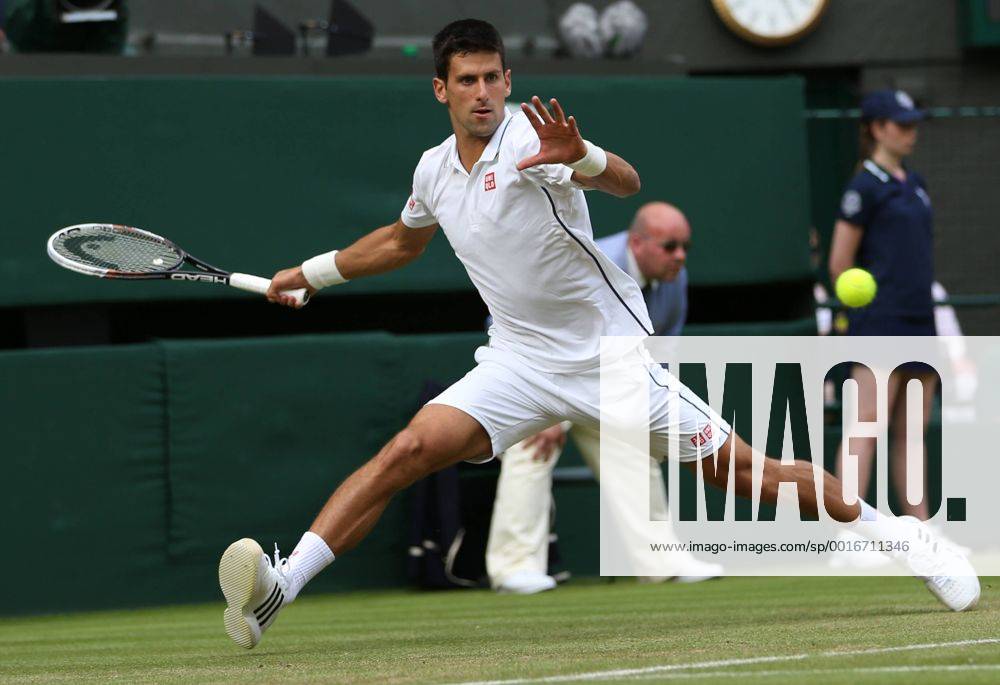 Serbia s Novak Djokovic in action during his match on day three of the 2014 Wimbledon Championships in London on June 25, 2014. LON2014062531