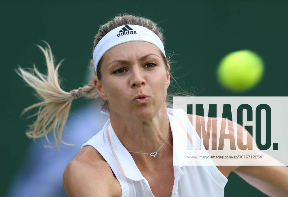 Maria Kirilenko of Russia competes during the women s singles second round match at the 2014 Wimbledon Championships in Wimbledon, southwest London, Britain, on June 25, 2014. (Xinhua MengxYongmin) (hy) (SP) BRITAIN-LONDON-TENNIS-WIMBLEDON-DAY 3