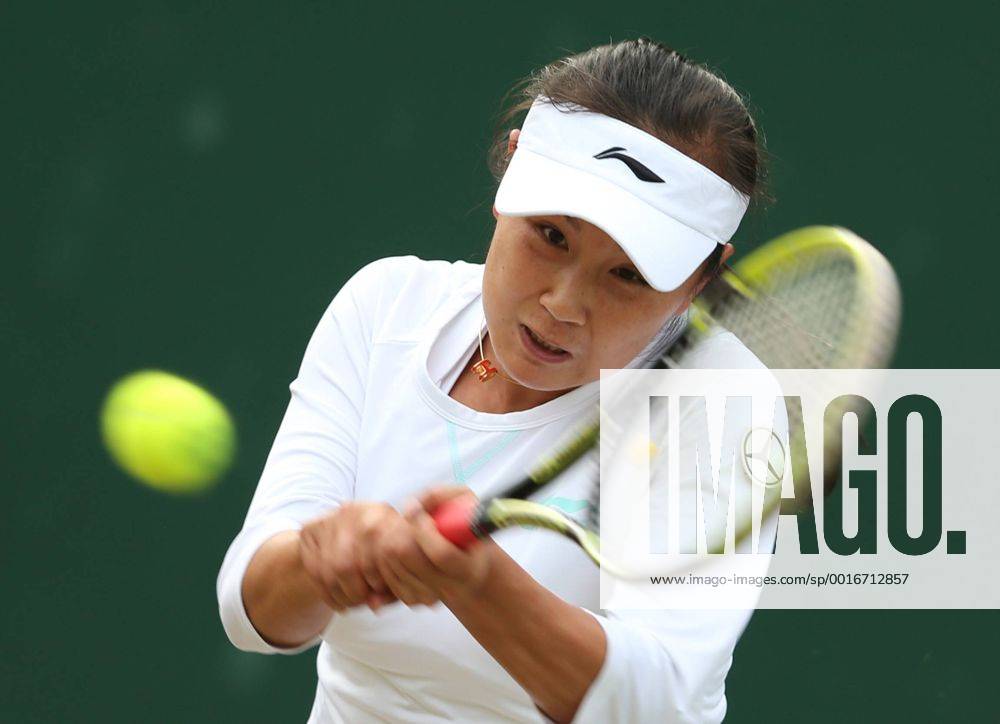 Peng Shuai of China competes during the women s singles second round match at the 2014 Wimbledon Championships in Wimbledon, southwest London, Britain, on June 25, 2014. (Xinhua MengxYongmin) (hy) (SP) BRITAIN-LONDON-TENNIS-WIMBLEDON-DAY 3