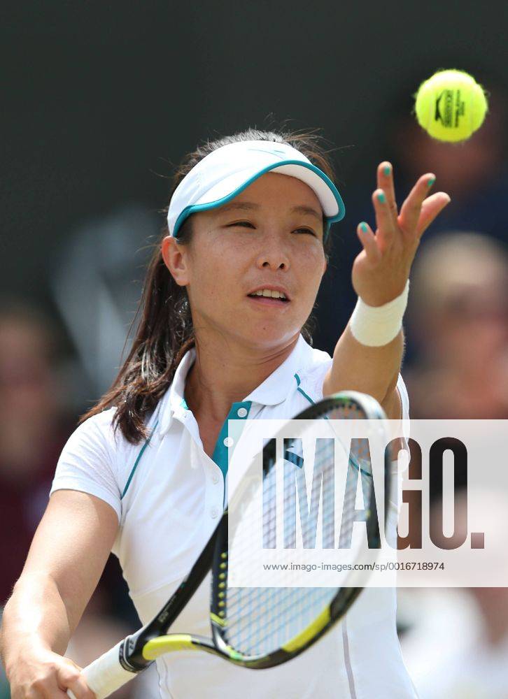 China s Zheng Jie serves the ball during the women s singles second round match