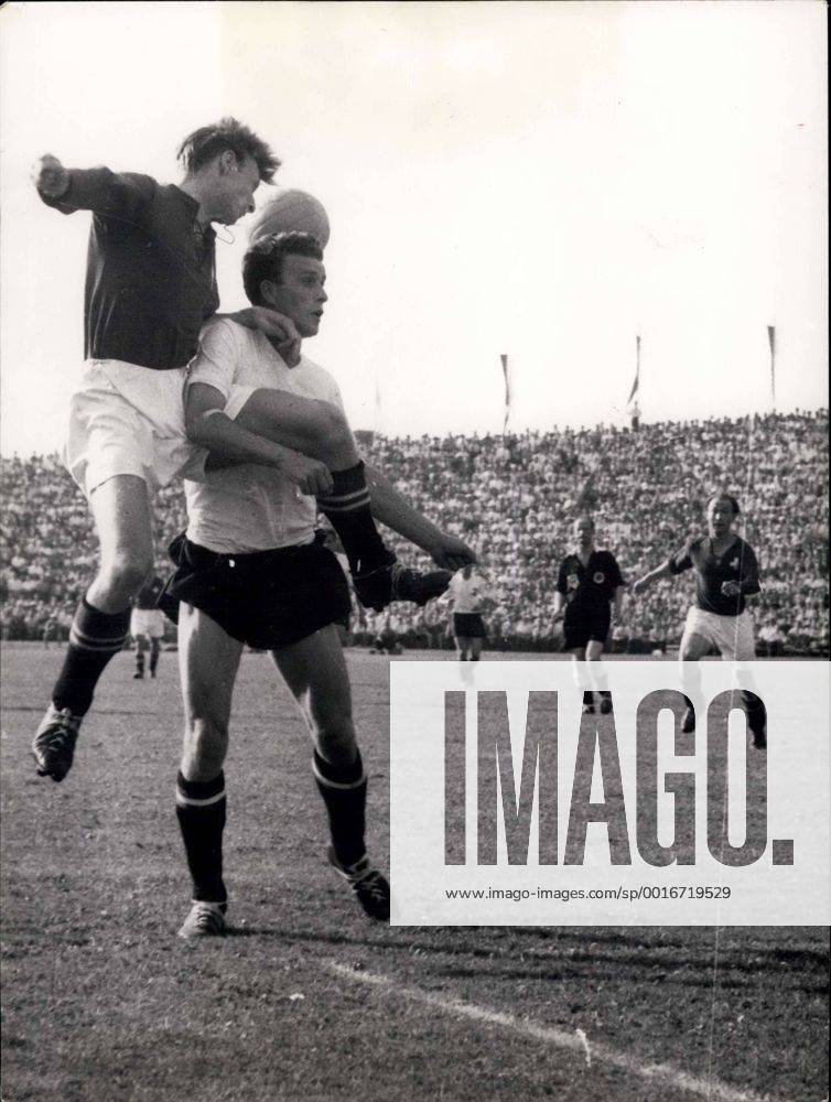 Jun. 26, 1954 - Swiss - Austria in Lausanne 5 : 7: A double foul , as picture shows. The swiss forward Charles Antenen is holding his opponent while the other is keeping his leg tight. The arbitrator Charlie Faultless can watch the one nor the other from his piont of view. Therefore no stop whistle to be heard. - ZUMAk09