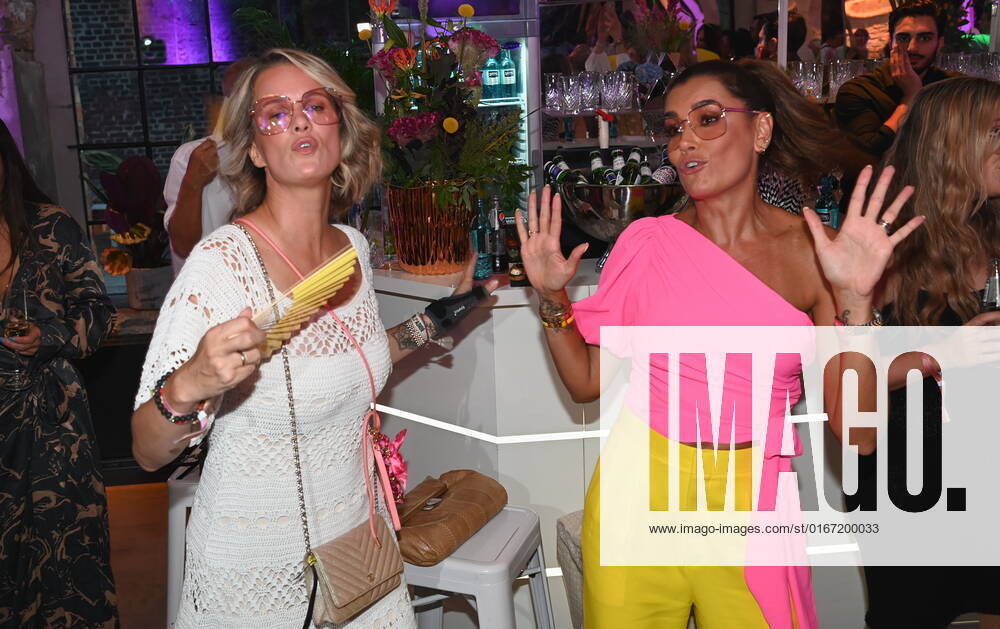 Monica Ivancan and Jana Ina Zarrella , l r, dance at the party for the presentation of the first Jana Ina Zarrella eyewear collection for the brand eyes more with party