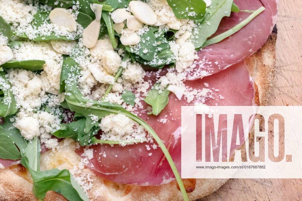 Gourmet pizza, Gourmet pizza with mozzarella, rocket, bresaola, parmesan and almonds. Top view., Gourmet pizza with mozzarella, rocket, bresaola, parmesan and almonds. Top view., 13.12.2021,