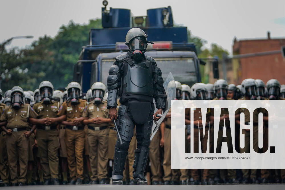 Anti-Government Protest In Sri Lanka An officer of the anti-riot unit who is going to disperse the rally in front of the police officers. August 30, 2022 Colombo, Sri Lanka. Colombo Sri Lanka