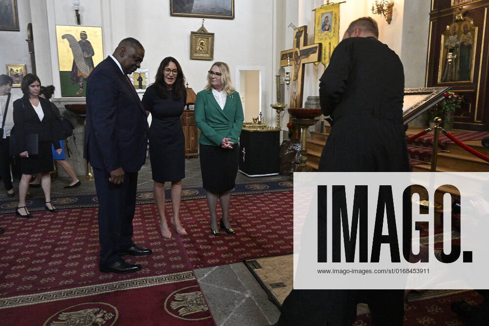 U.S. Secretary of Defense Lloyd Austin, left, Czech Defence Minister Jana Cernochova, right, pay homage to the Czechoslovak paratroopers who killed Nazi Deputy Reichsprotector Reinhard Heydrich, Friday, Sept. 9, 2022, the Saint Cyril and Methodius Church, Prague, Czech Republic. At center is mayor of Prague 2 Alexandra Udzenija. (CTKxPhoto VitxSimanek) CTKPhotoP2022090903047