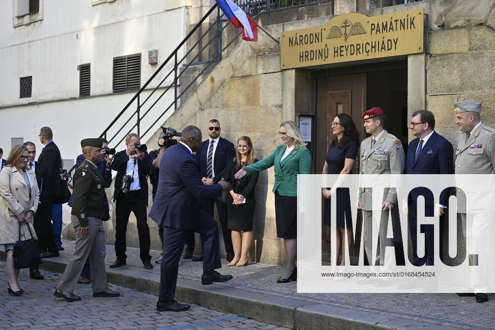 U.S. Secretary of Defense Lloyd Austin, left, shakes hands with Czech Defence Minister Jana Cernochova before a homage to the Czechoslovak paratroopers who killed Nazi Deputy Reichsprotector Reinhard Heydrich, Friday, Sept. 9, 2022, the Saint Cyril and Methodius Church, Prague, Czech Republic. (CTKxPhoto VitxSimanek) CTKPhotoP2022090902724