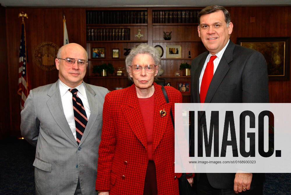 Secretary Mel Martinez with Jeane Kirkpatrick. Secretary Mel Martinez with Jeane Kirkpatrick Subject, Secretary Mel Martinez receiving visit from former U.S. Ambassador to the United Nations, Jeane Kirkpatrick.