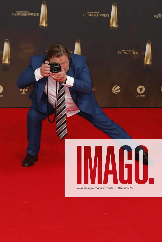 The German Television Award 2021 Armin Rohde with his Leica on the red carpet at the award ceremony The German Television Award The TV Highlights of the Year on September 14 at the MMC Studios Cologne