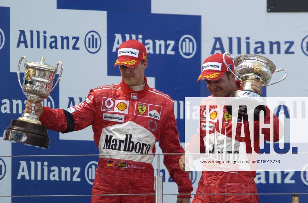 SCHUMACHER Michael Team Scuderia Ferrari Sieger Großer Preis von Europa 2004 auf dem Nürburgring.Sport Motorsport Formel 1 Siegeehrung mit Rubens Barrichello. Copyright