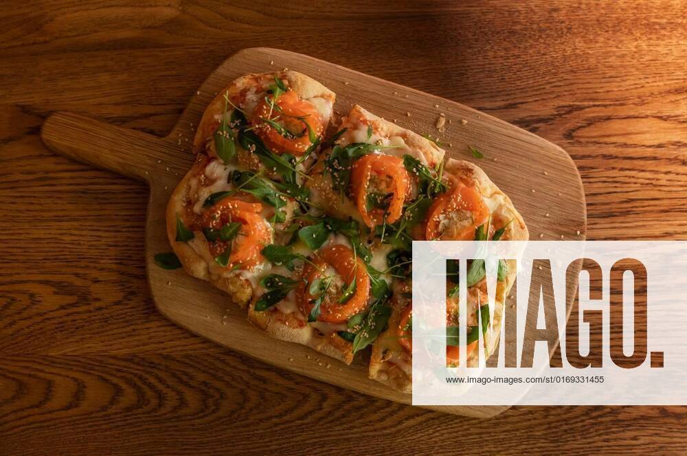 Roman Pizza with salmon, Pizza with salmon on roman dough with ruccola, Pizza with salmon on roman dough with ruccola, 02.04.2022,